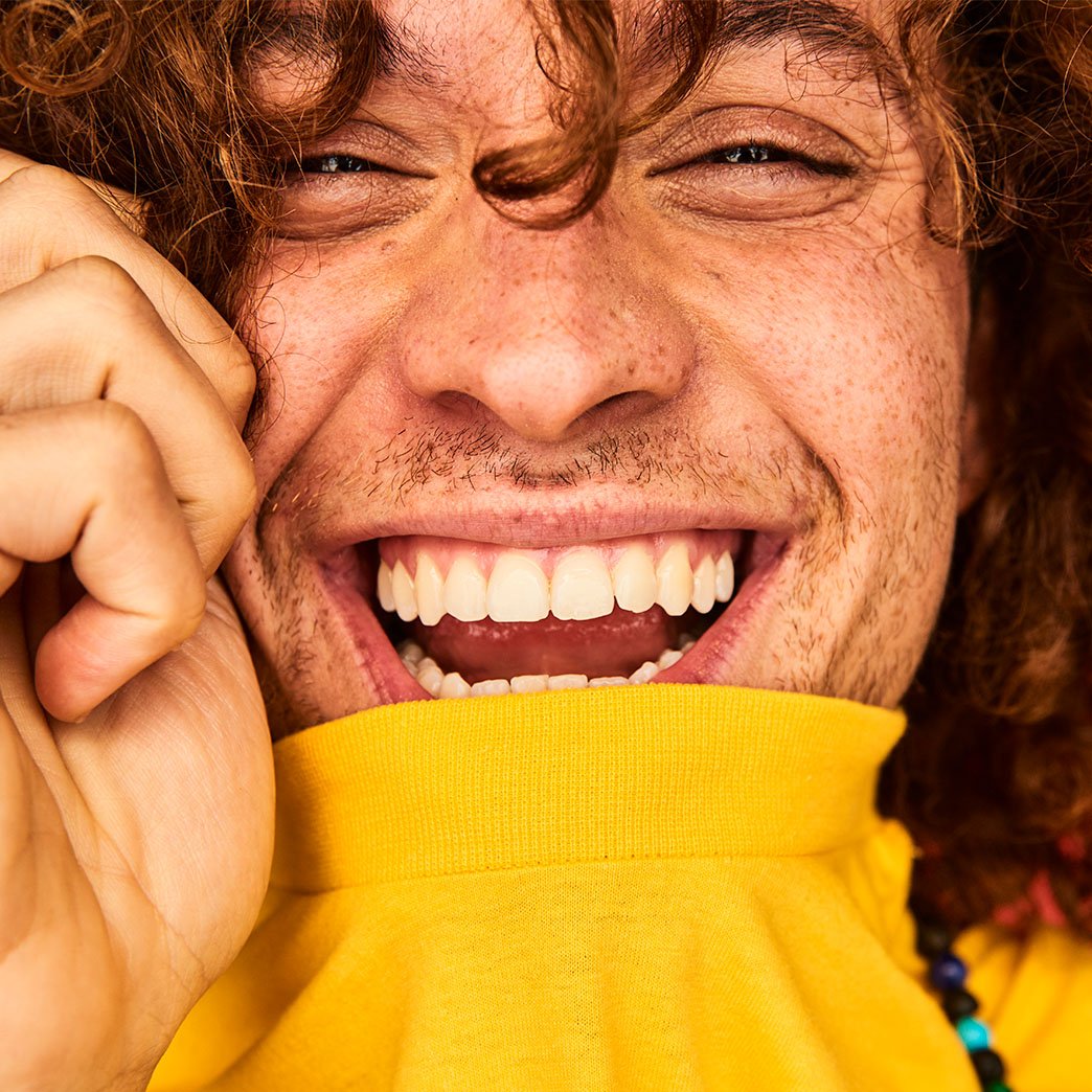 Colourful studio portrait of a young man.